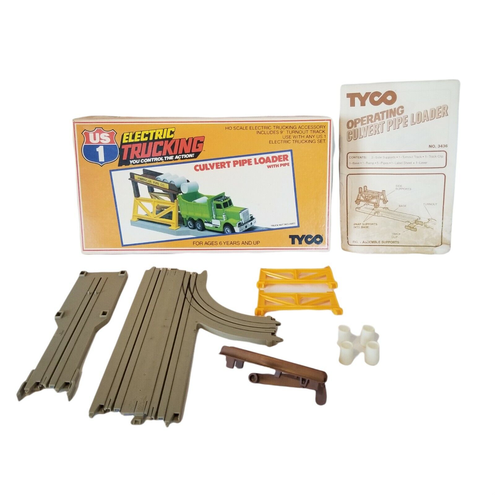 Tyco Electric Trucking Culvert Pipe Loader With Pipe #3436 HO Scale Vintage