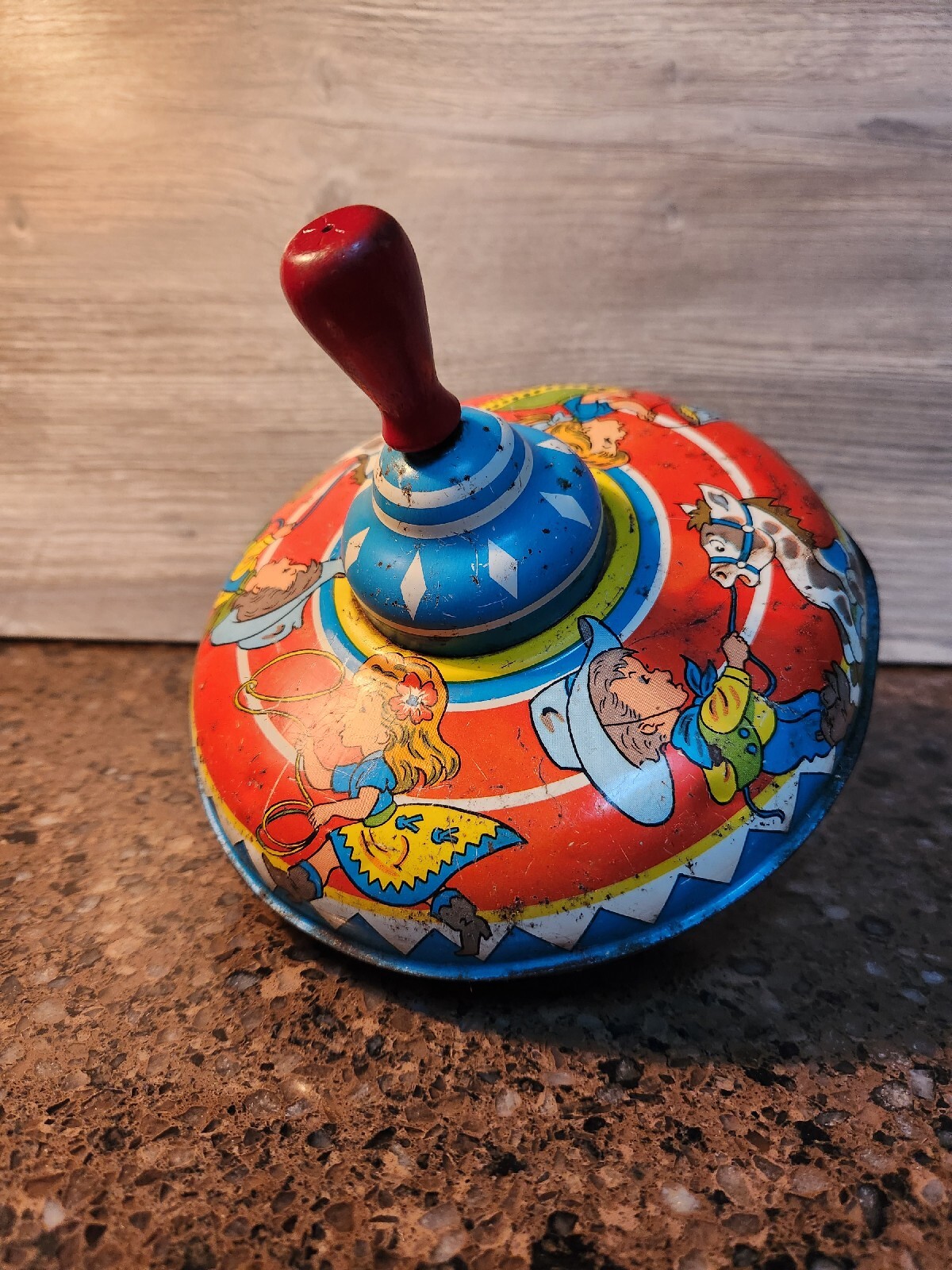 VINTAGE Bright Colored Tin Large Top Toy with Cowboy & Cowgirl WORKS