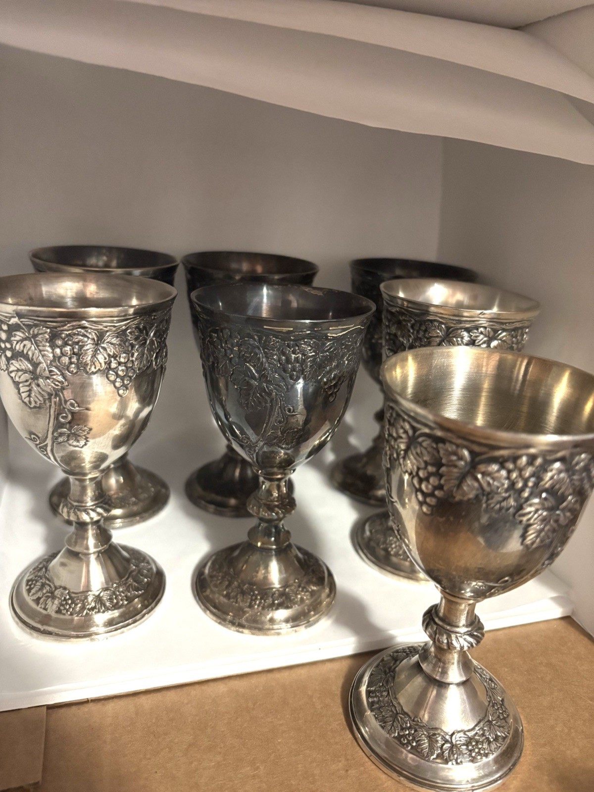 A Set Of 7 Grape And Vine Themed Silver-Plated Goblets
