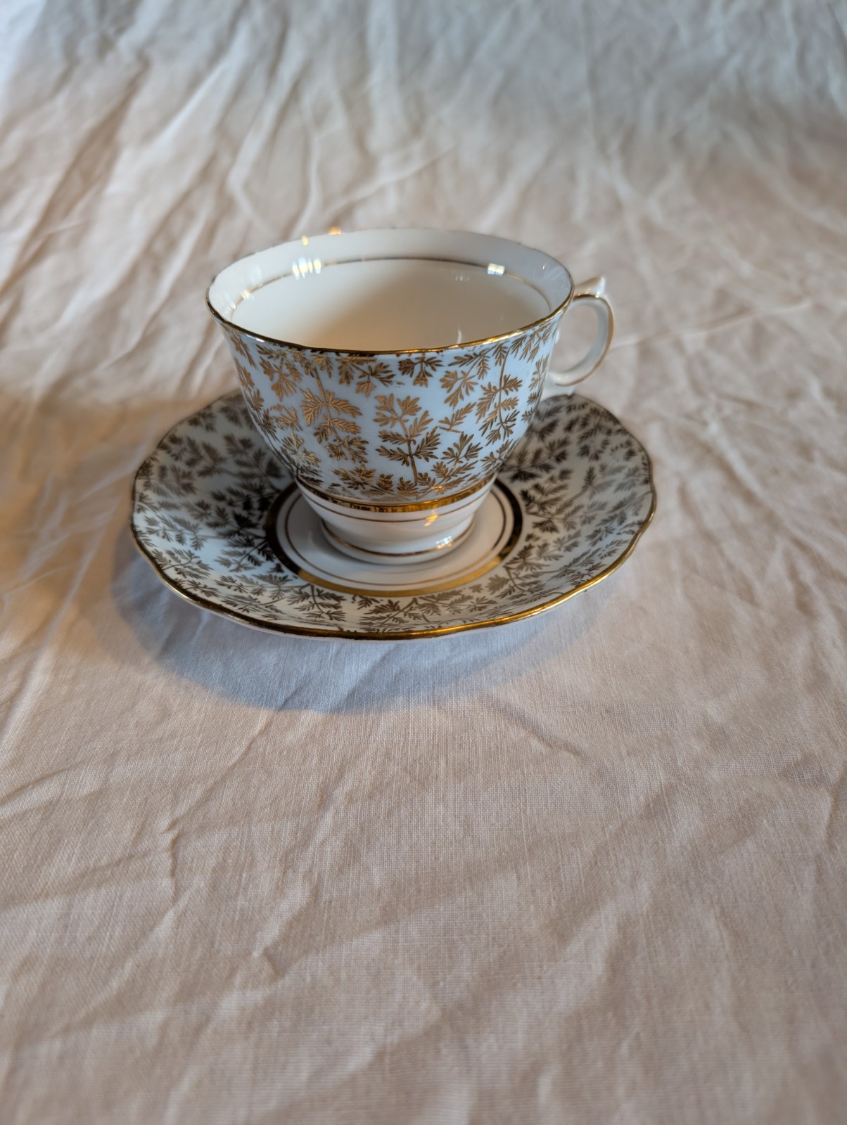 Colclough  Elegant Gold and Blue Tea Cup and Saucer Set