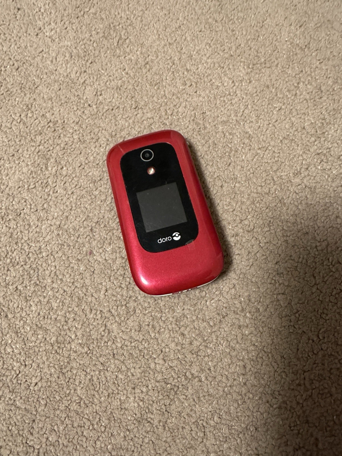 DORO CELLULAR-Red FLIP PHONE FOR PARTS ONLY UNTESTED