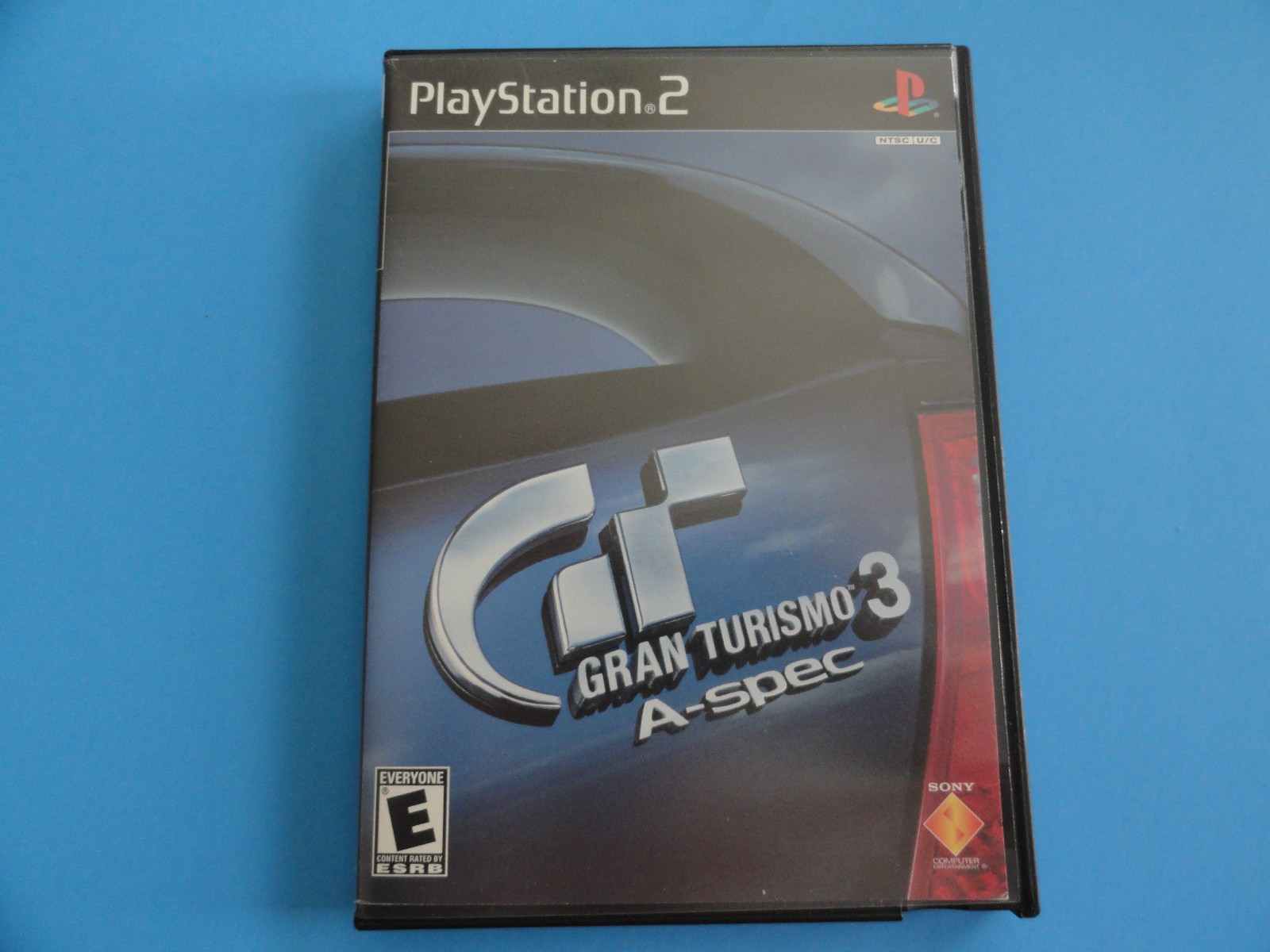 PS2 GRAN TURISMO 3 A-SPEC BLACK LABEL COVER ART IN BLOCKBUSTER VIDEO CASE