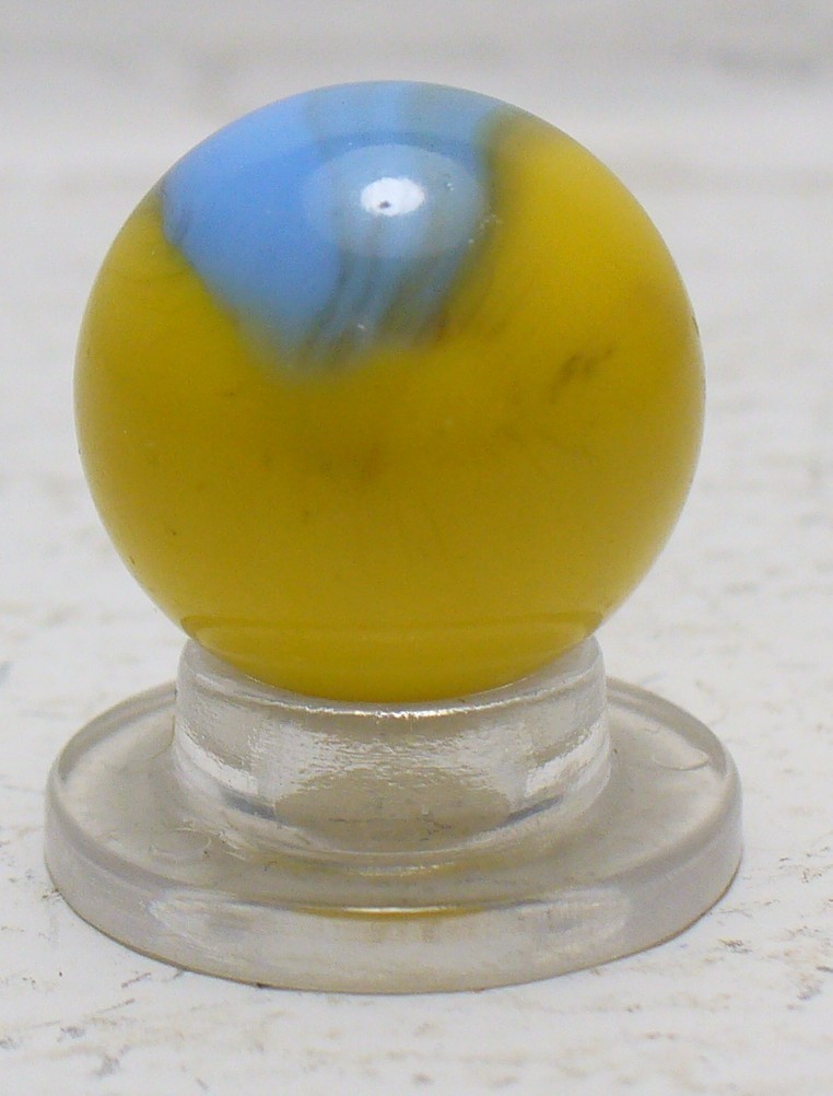 #1100 Vintage Master Comet Patch Marble.  Yellow with a nice bright blue patch