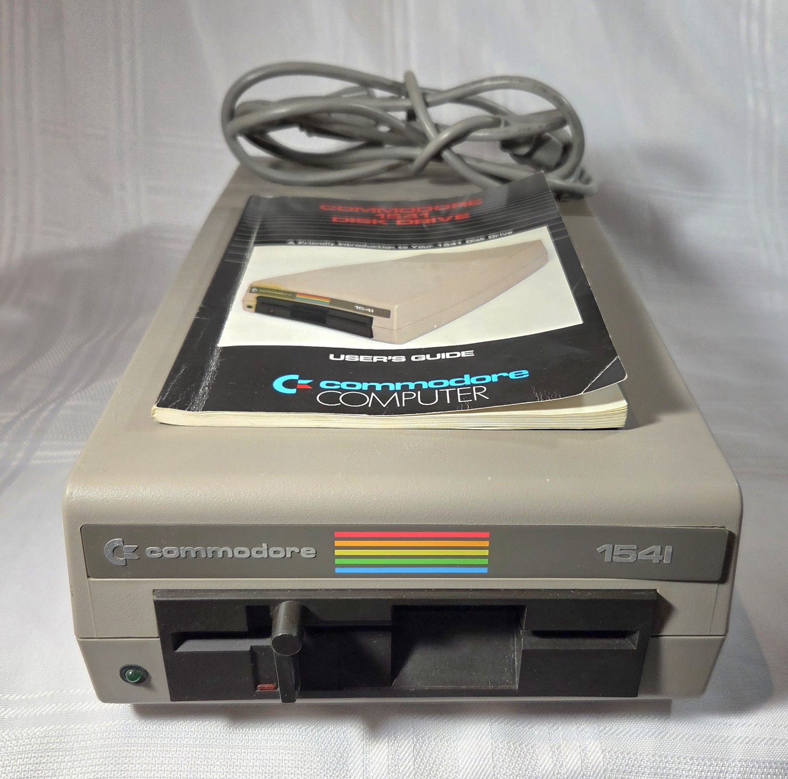 Commodore 1541 5.25" Floppy Disk Drive for C64 With Manual-- POWERS ON UNTESTED!