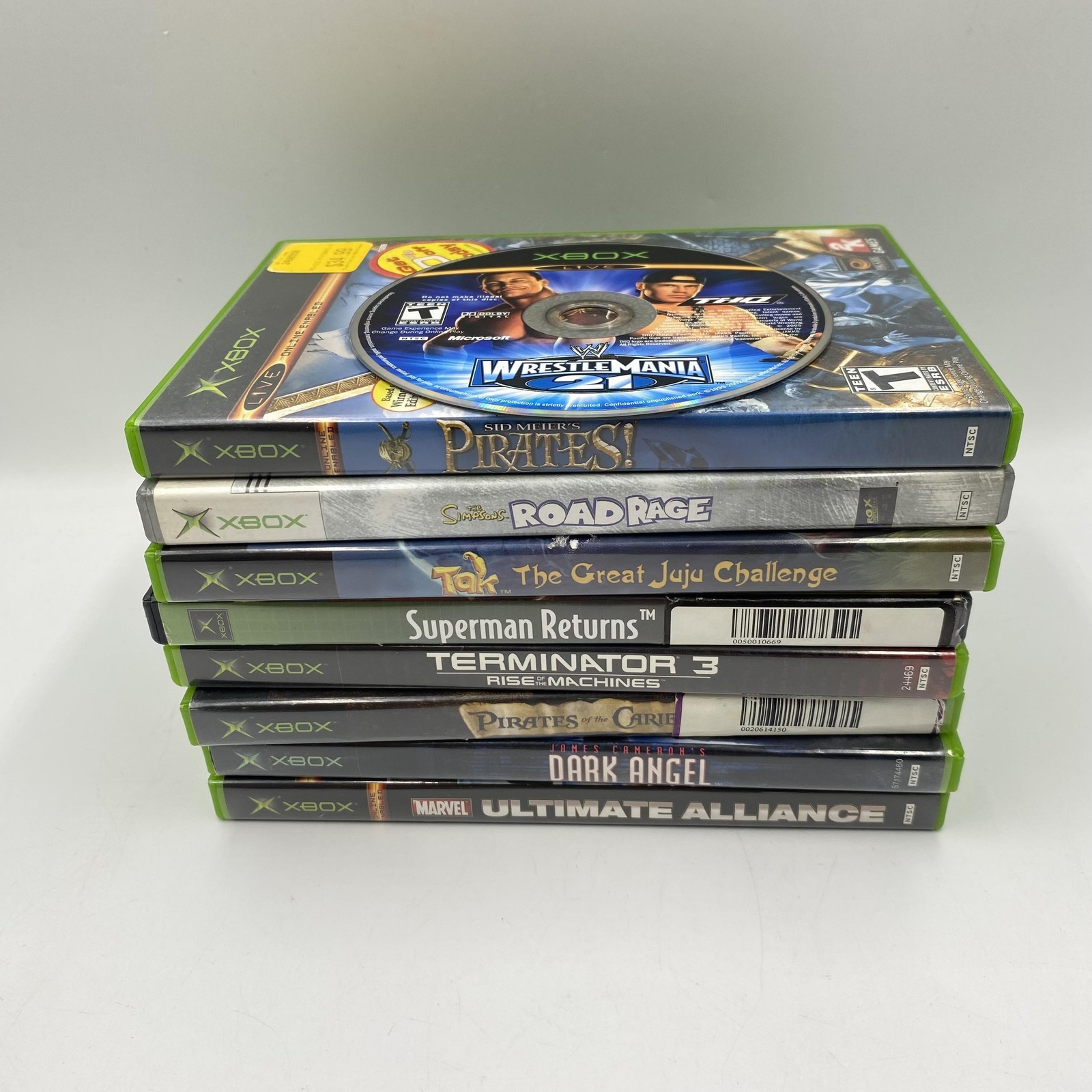 Microsoft Xbox Original Game Lot 9 Pirates Simpsons Tak Marvel Terminator WWE
