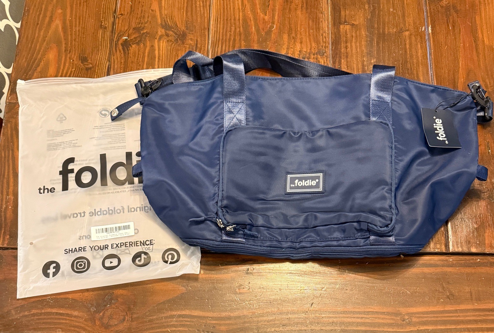 the FOLDIE NEW Foldable Travel Tote Bag 40L Navy Blue NWT