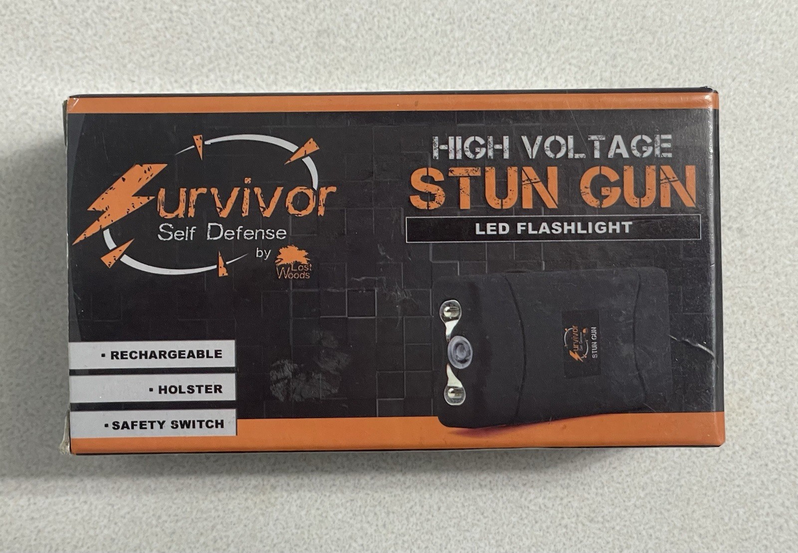 SURVIVOR HIGH VOLTAGE RECHARGEABLE STUN GUN W/ LED & HOLSTER BLACK