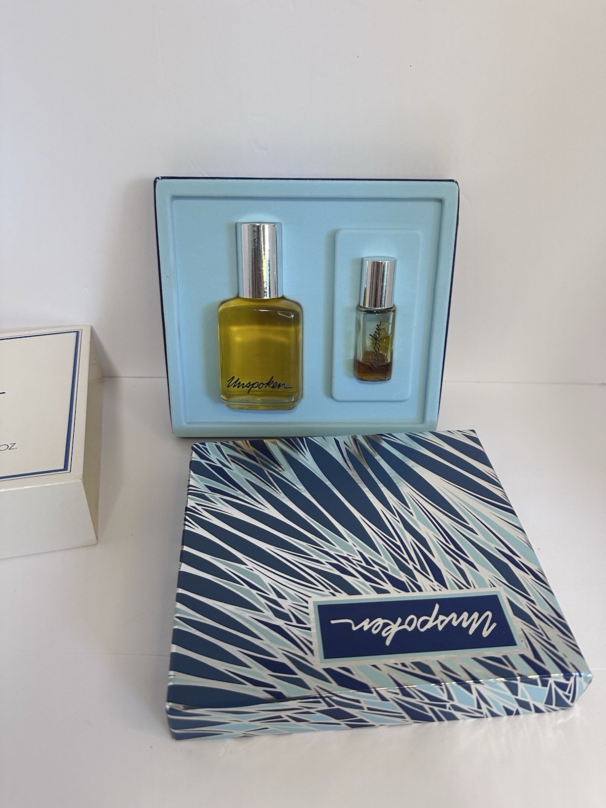 NEW Gift Set Avon's RETIRED SENT "UNSPOKEN" ultra 2 oz cologne , .33 purse conce