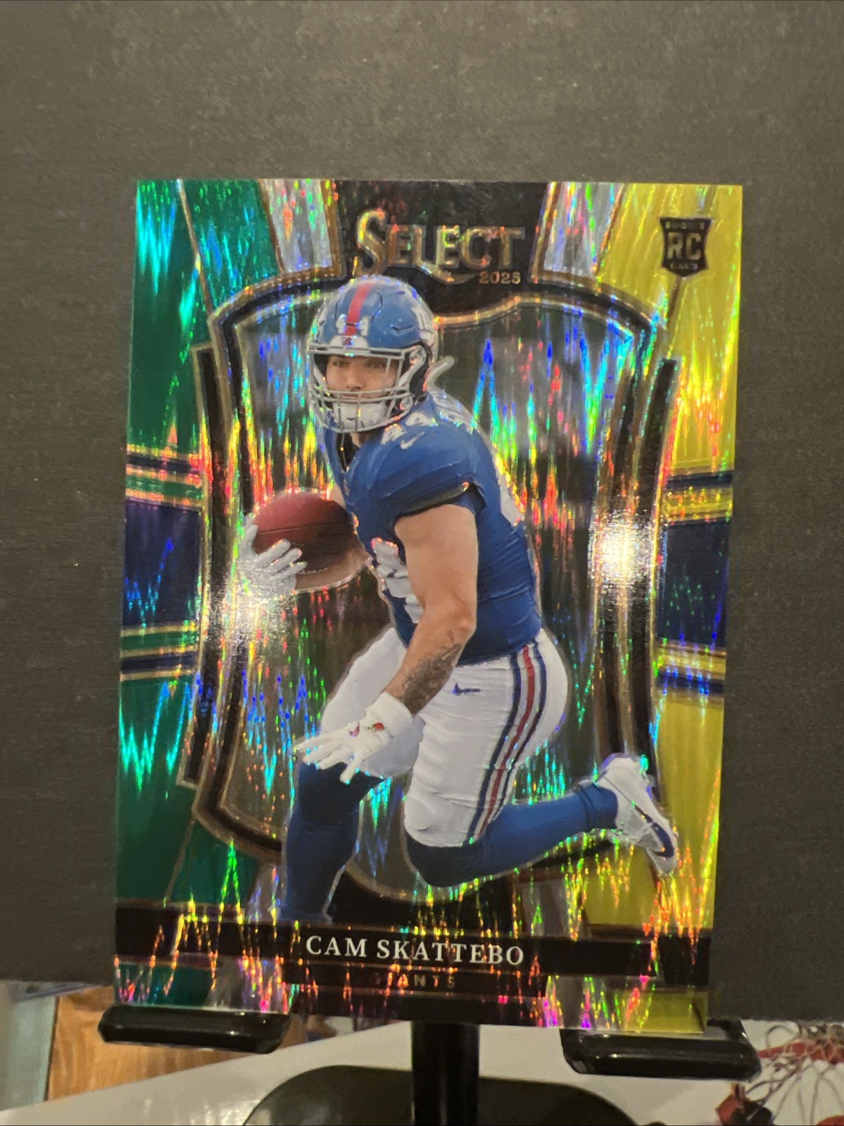 2025 Panini Select Cam Skattebo #195 Premier Level Green & Yellow Shock Prizm RC