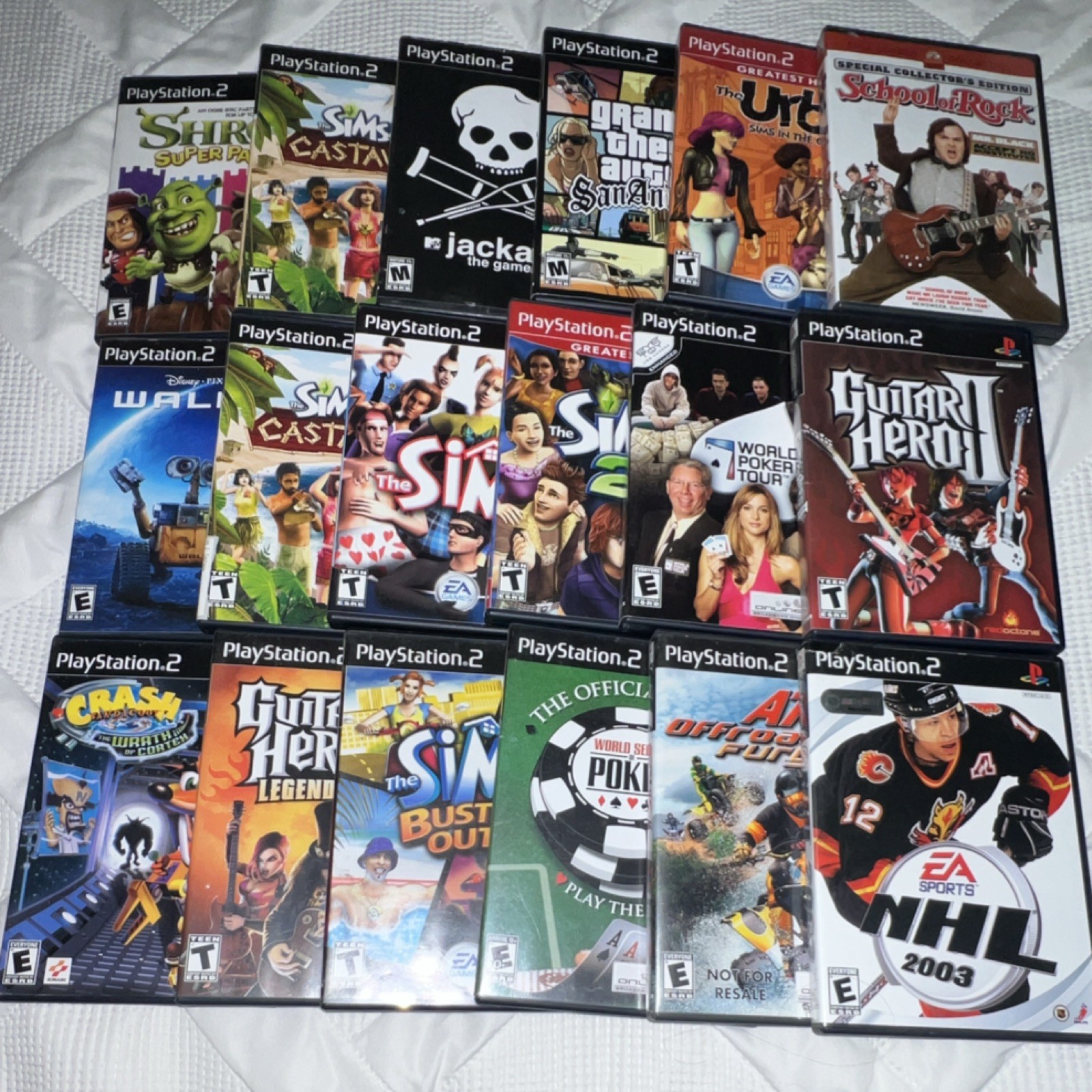 PlayStation 2 Game Lot - The Sims, Guitar Hero, Shrek, Crash, Wall-E, Sports