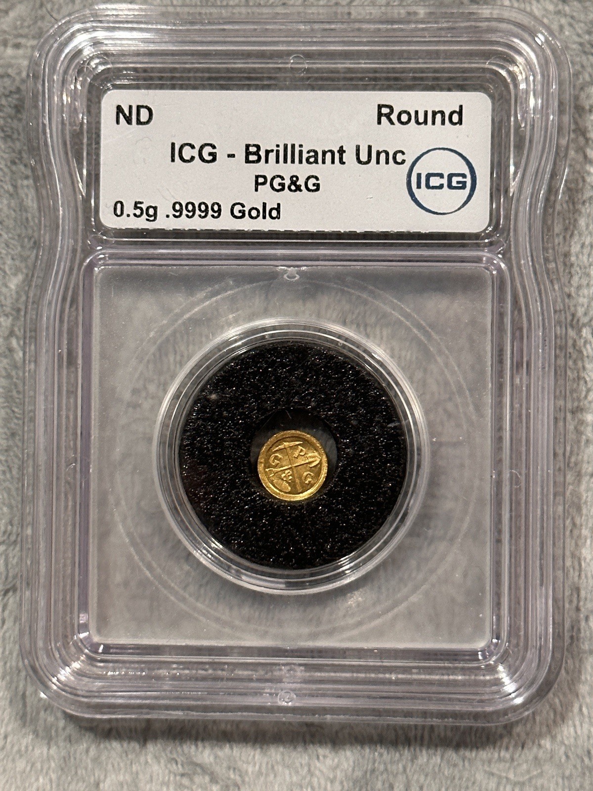 0.5g .9999 Gold PG&G Half Gram Round ICG Brilliant Unc PL Fractional Slab