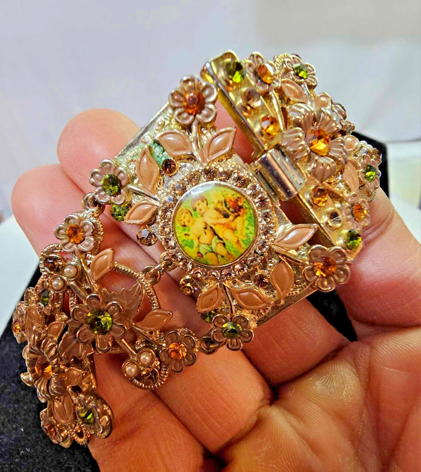 Vtg Goldtone Wide/Thick Bracelet w cherub/putti green brown stones enamel floral