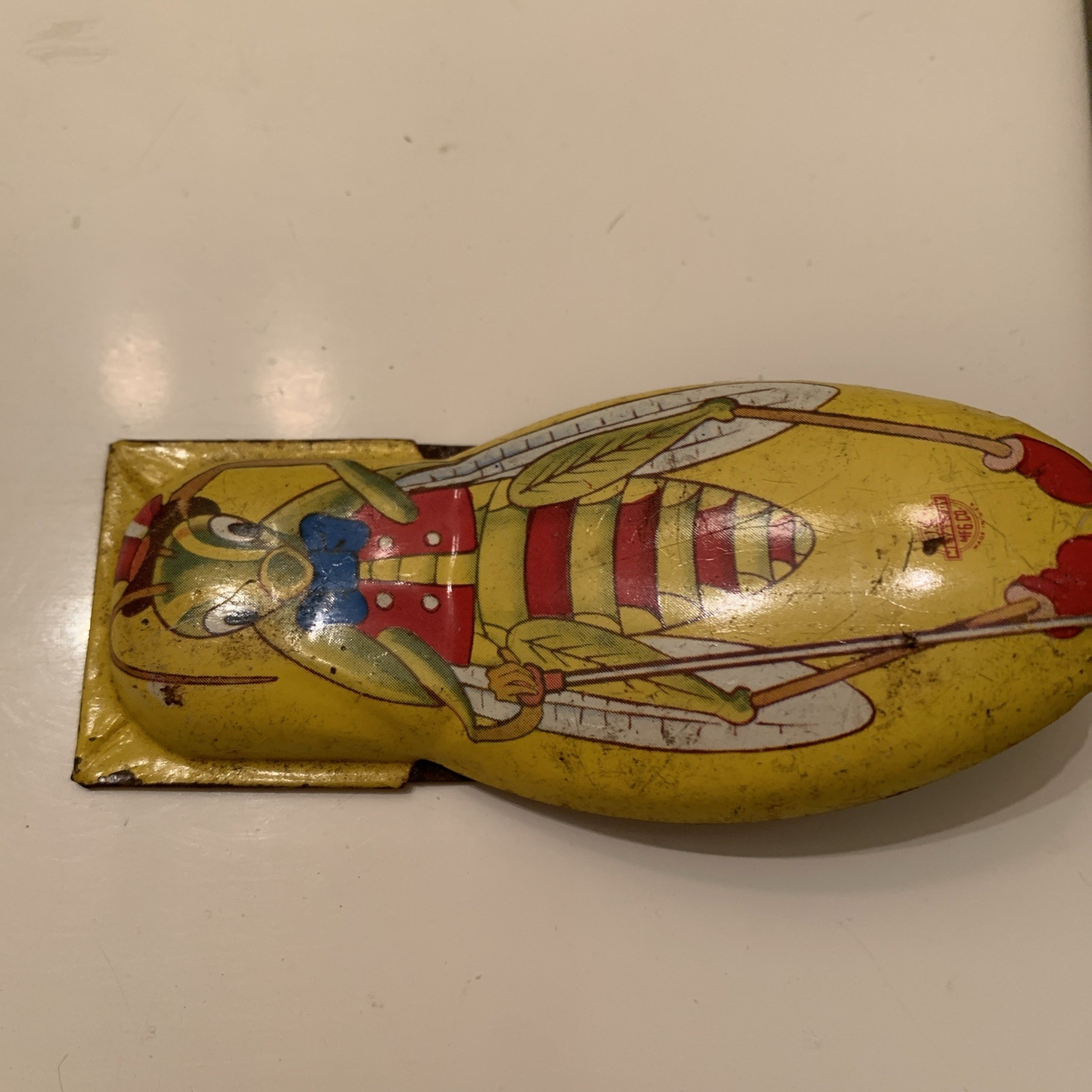 GRASSHOPPER TIN LITHO CLICKER NOISEMAKER VINTAGE 4" LONG U.S. METAL TOY MFG. CO.
