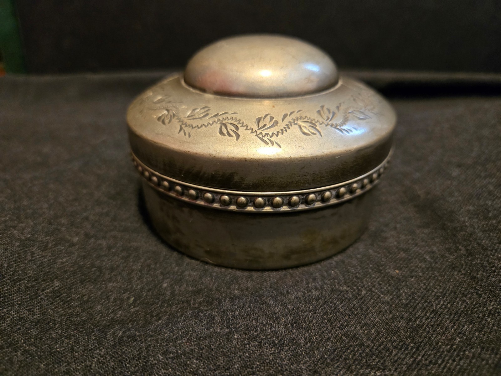 Vintage silver plated decorative tin with floral scroll work and beaded band