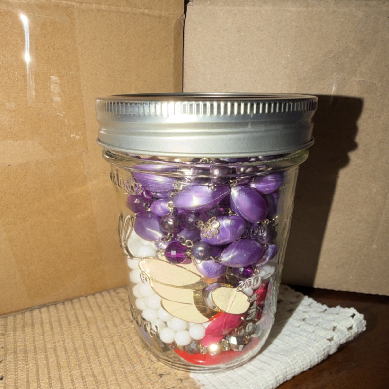 Multicolor Mixed Lot of Beads and Bracelets in Glass Jar for Women