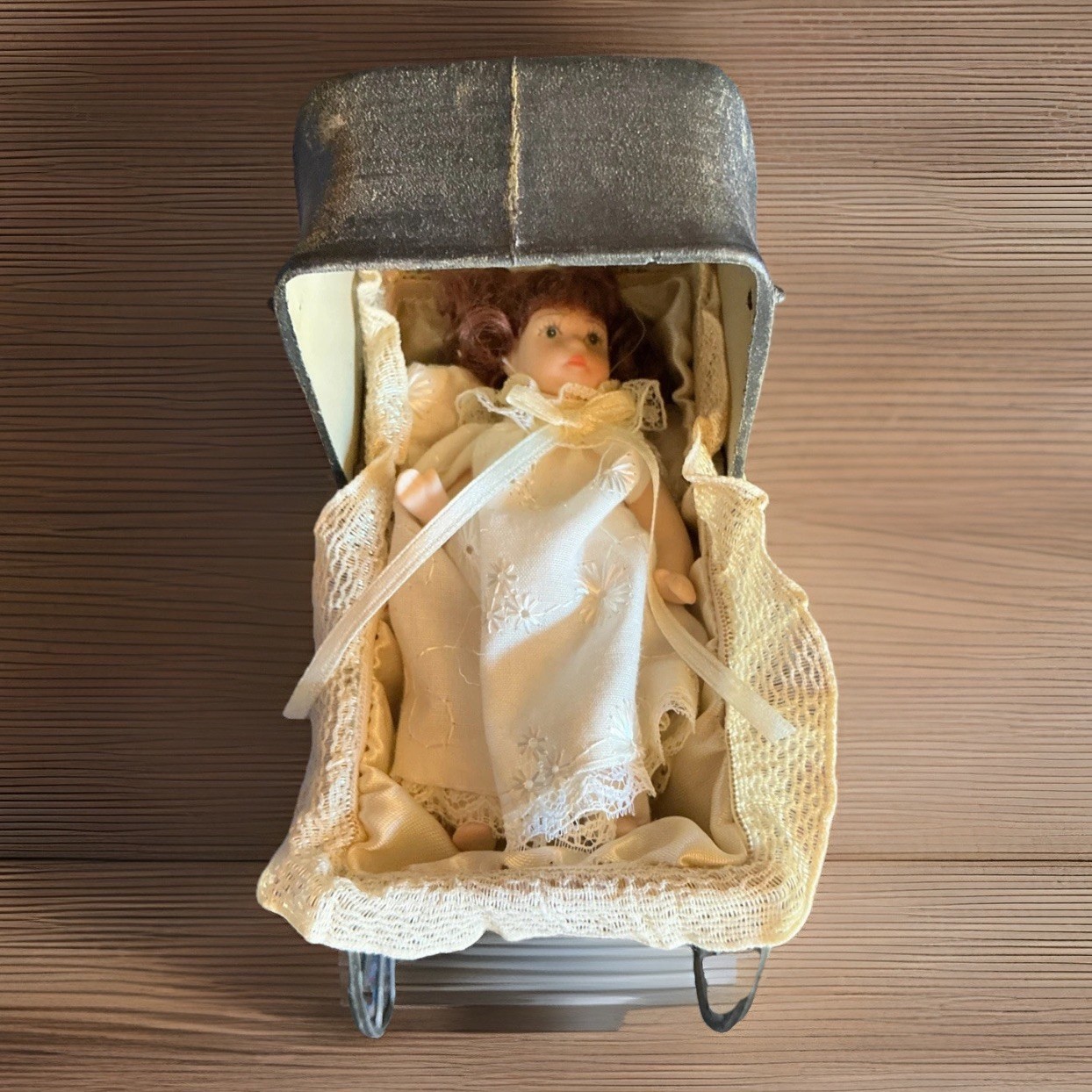 Vintage doll carriage or pram With Doll