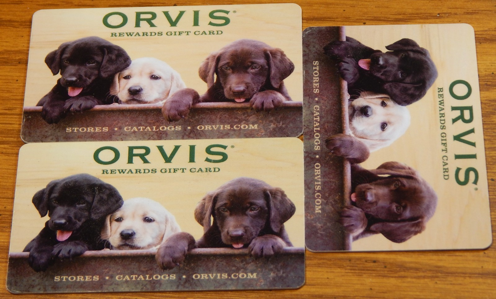 3) ORVIS GIFT CARDS 125.00 TOTAL FACE VALUE 50,50 &25 LQQK