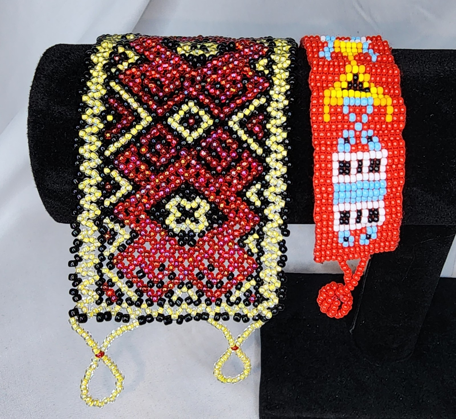 (2) Handmade Beaded Bracelets featuring designs
