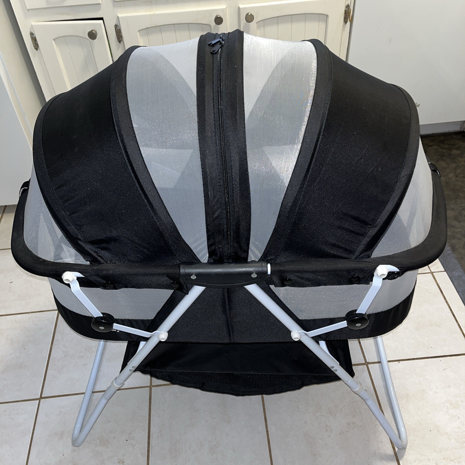 Dream On Me Portable Bassinet With Zip-Up Canopy and Extra Storage Underneath