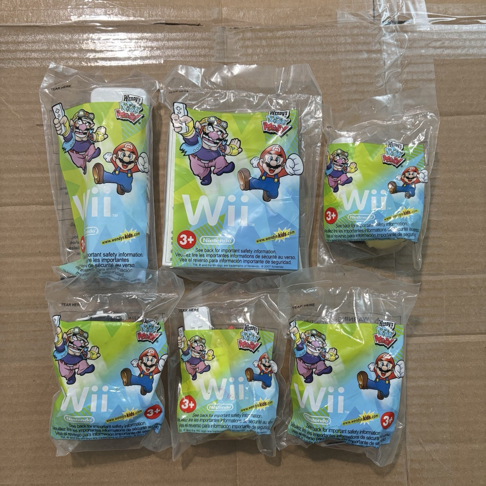 Wendy’s Toy, Mario Nintendo Wii Lot Wario Etc Sealed In Bags New Bundle