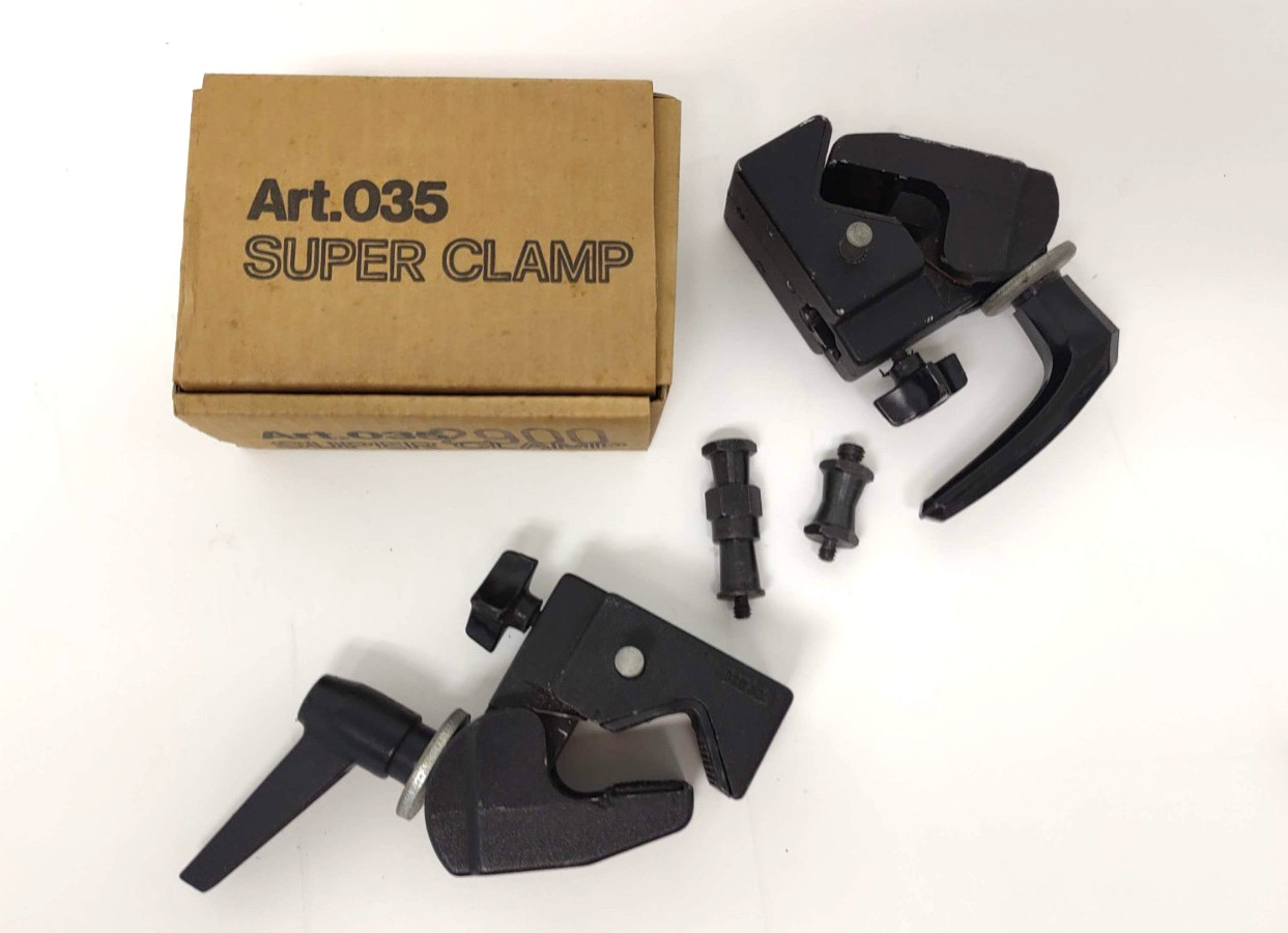 Pair Manfrott Bogen super clamps with studs  One is brand new. Both EXCELLENT
