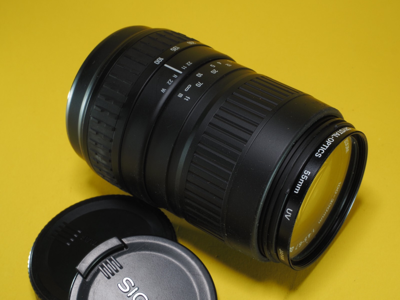 Sigma AF 100-300mm f4.5-6.7 DL for Minolta/Sony with lens hood and both caps