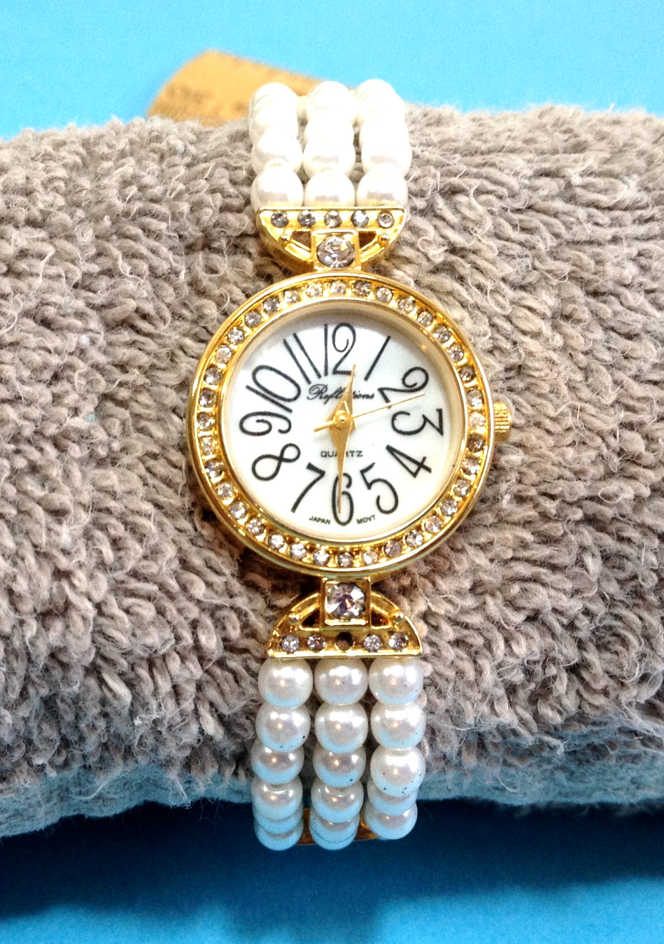 Vintage Reflections Watch w/Clear Cut Stones Gold Tone Pearl Style Band