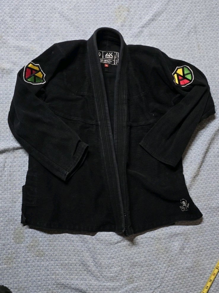 Armor Kimonos jujitsu gi A1 Black, Red Yellow And Green Trim Good Quality