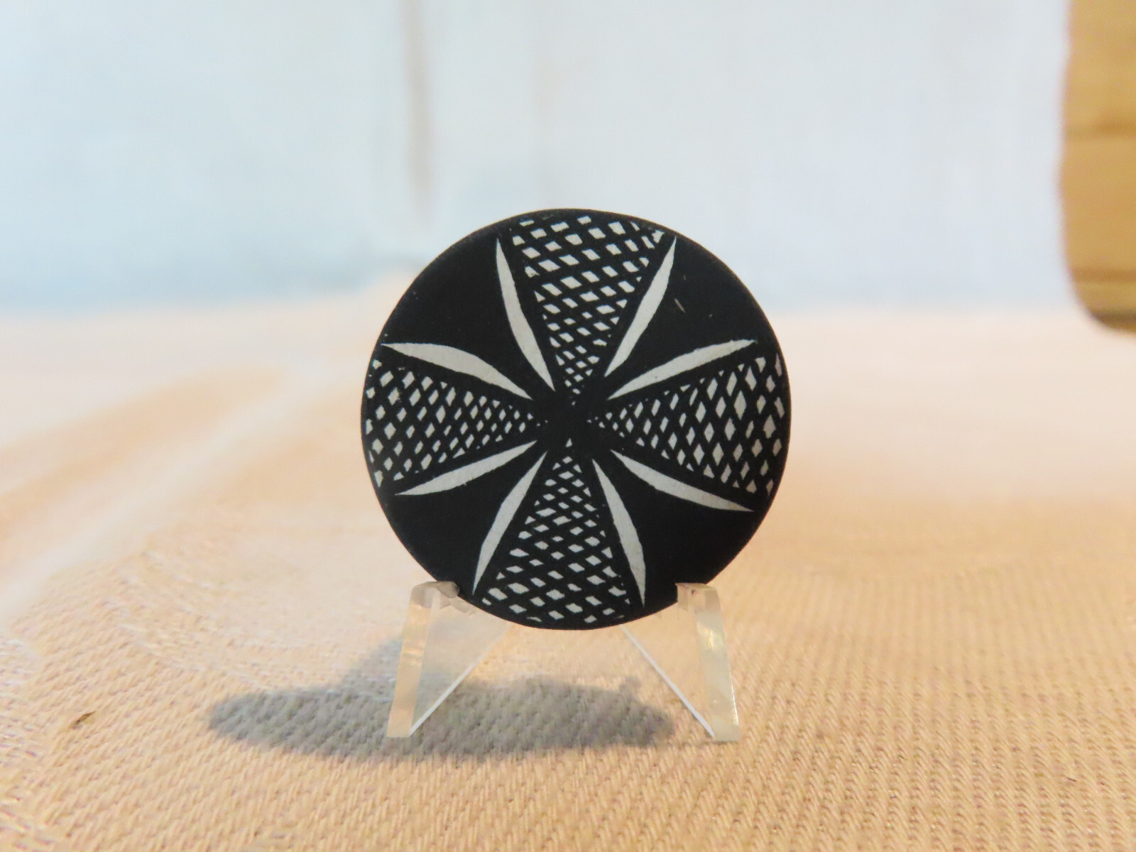 Miniature Southwestern Acoma pottery plate signed J.G., dollhouse size