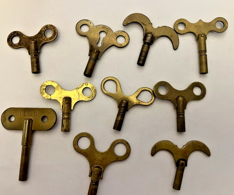 10 ANTIQUE  BRASS CLOCK KEYS - B2