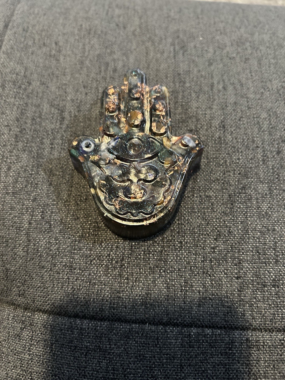 Set Of Two Resin Sculptures- One Hamsa And One Leaf