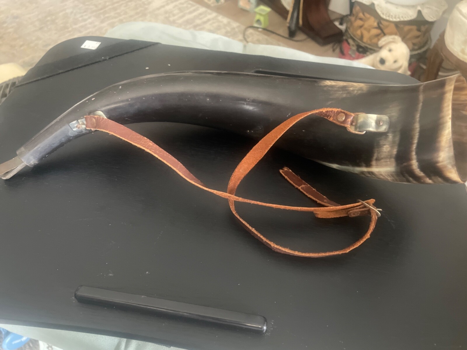 Horn 12" Overall Brown and Beige -Horn with leather strap and reed. 