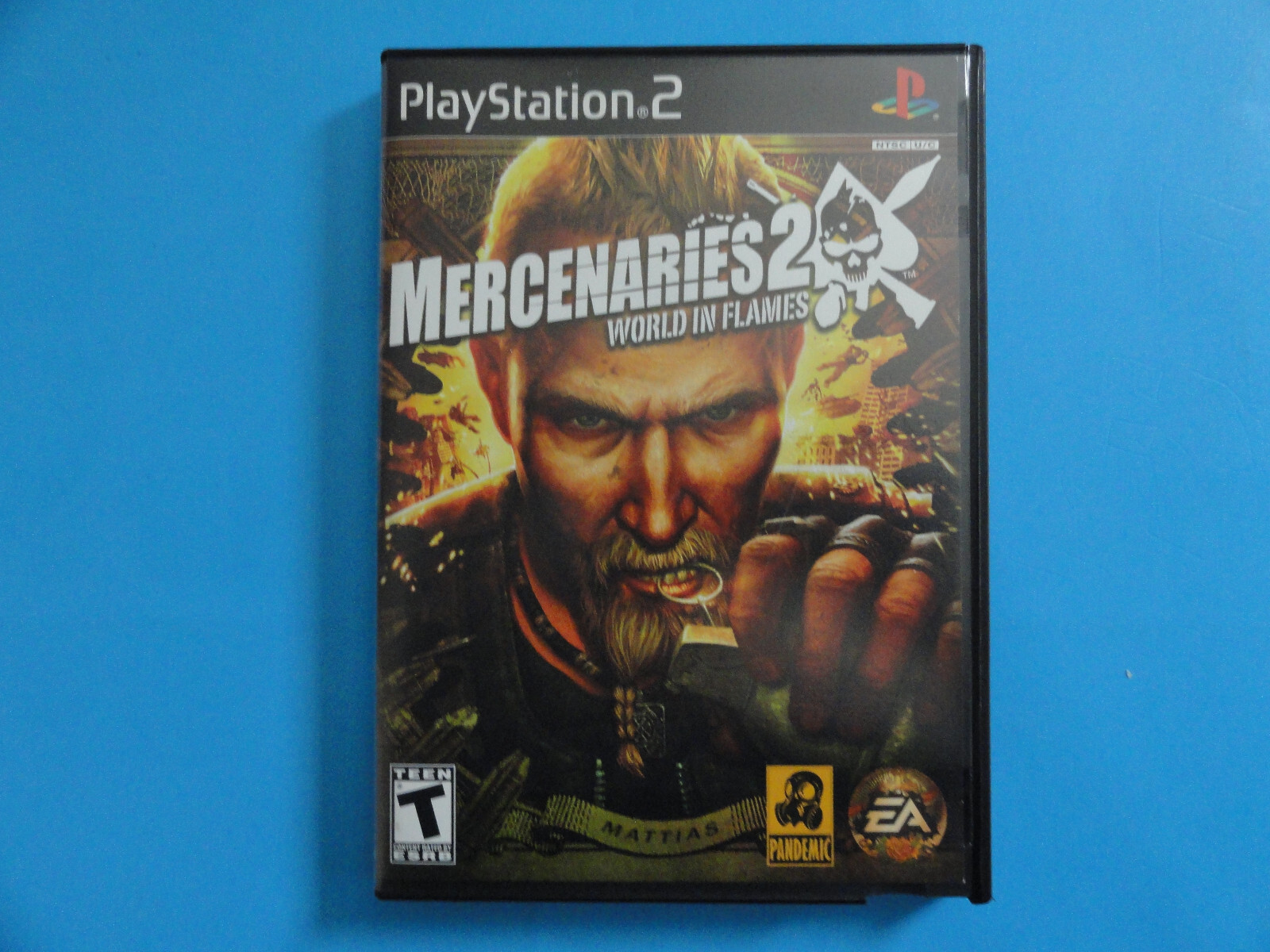 PS2 MERCENARIES 2 WORLD IN FLAMES - ORIGINAL COVER ART IN BLOCKBUSTER VIDEO CASE