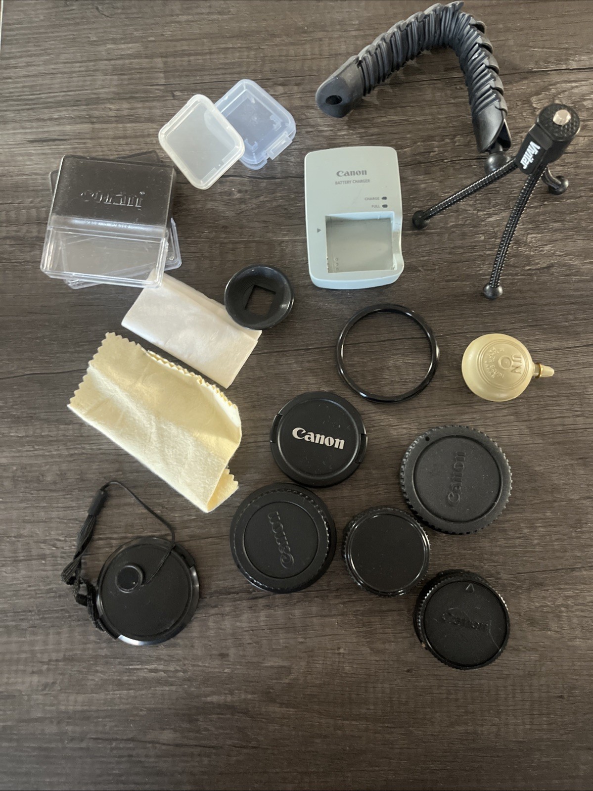 Mixed Camera Accessories Lot Canon Lens Caps Battery Charger Vivitar Tripod