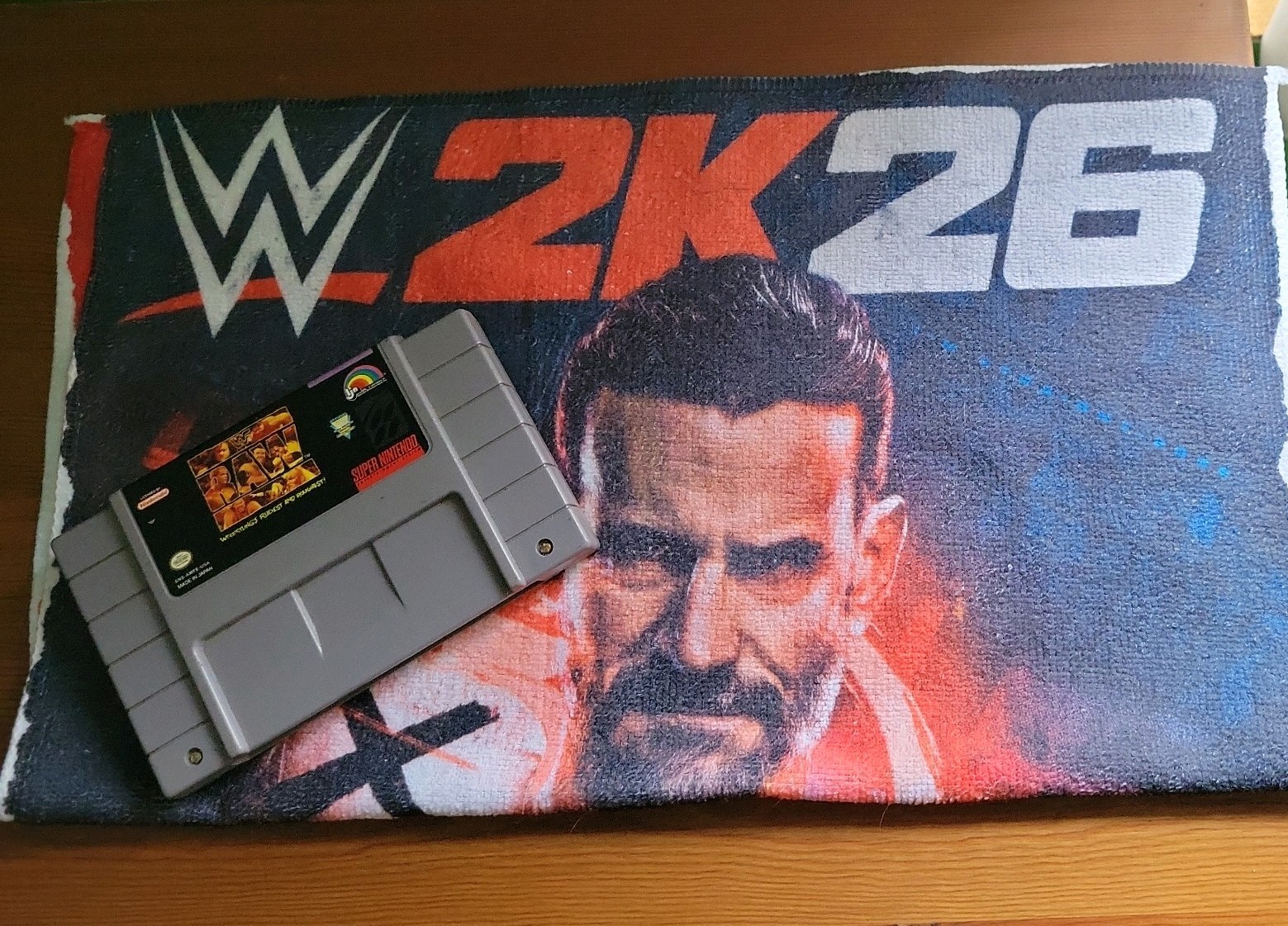 Custom WWE Bundle Elimintion Chamber 2k26 exclusive towel AND SNES WWF RAW Game