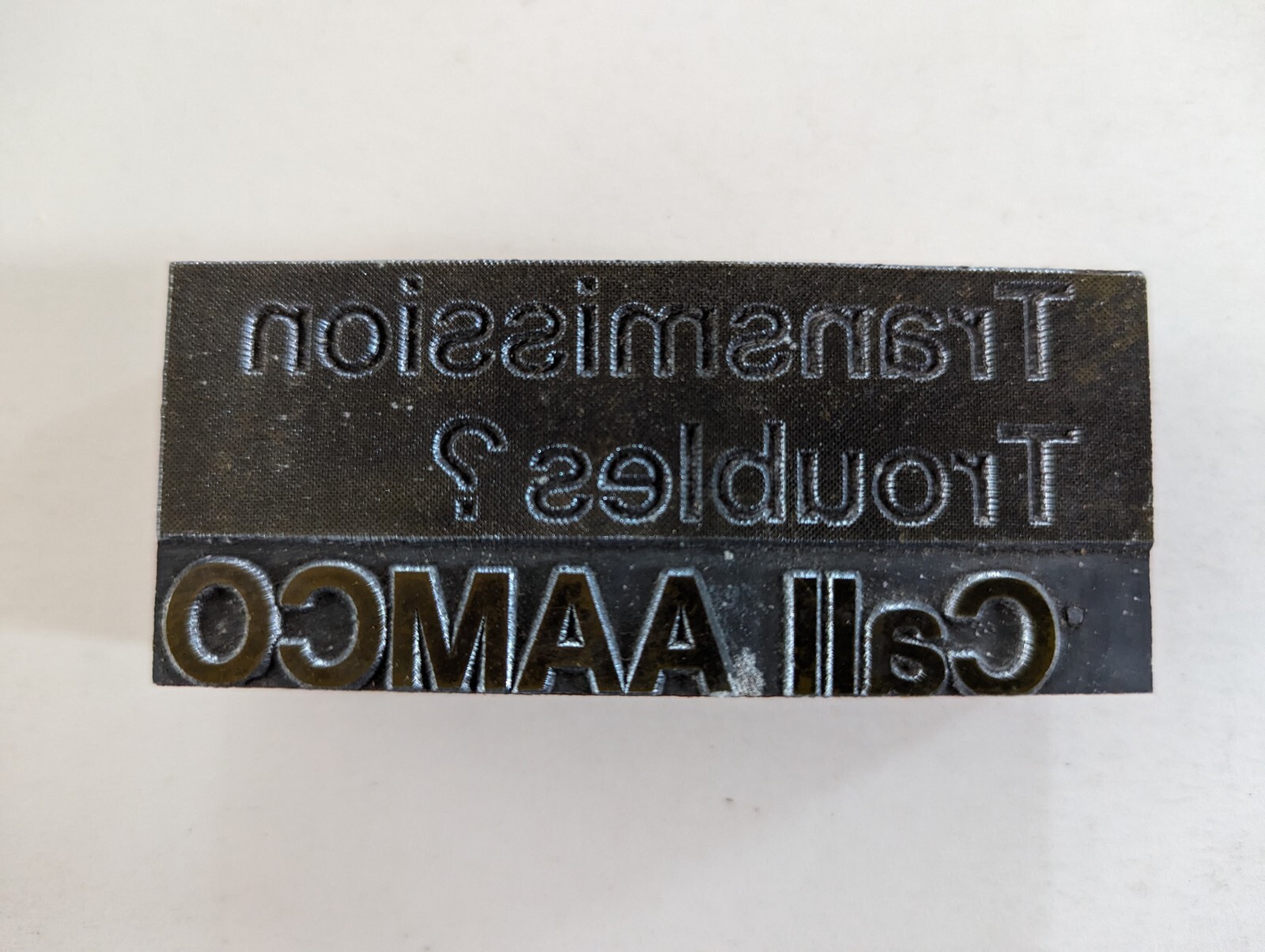 AAMCO Ad Printer Printing Block Metal Plate Wood Vtg Abt 3.5"X1.5"