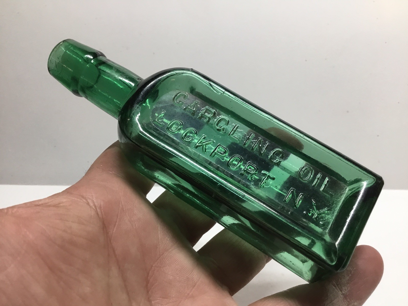 Small Antique Hunter Green Gargling Oil Medicine Bottle.