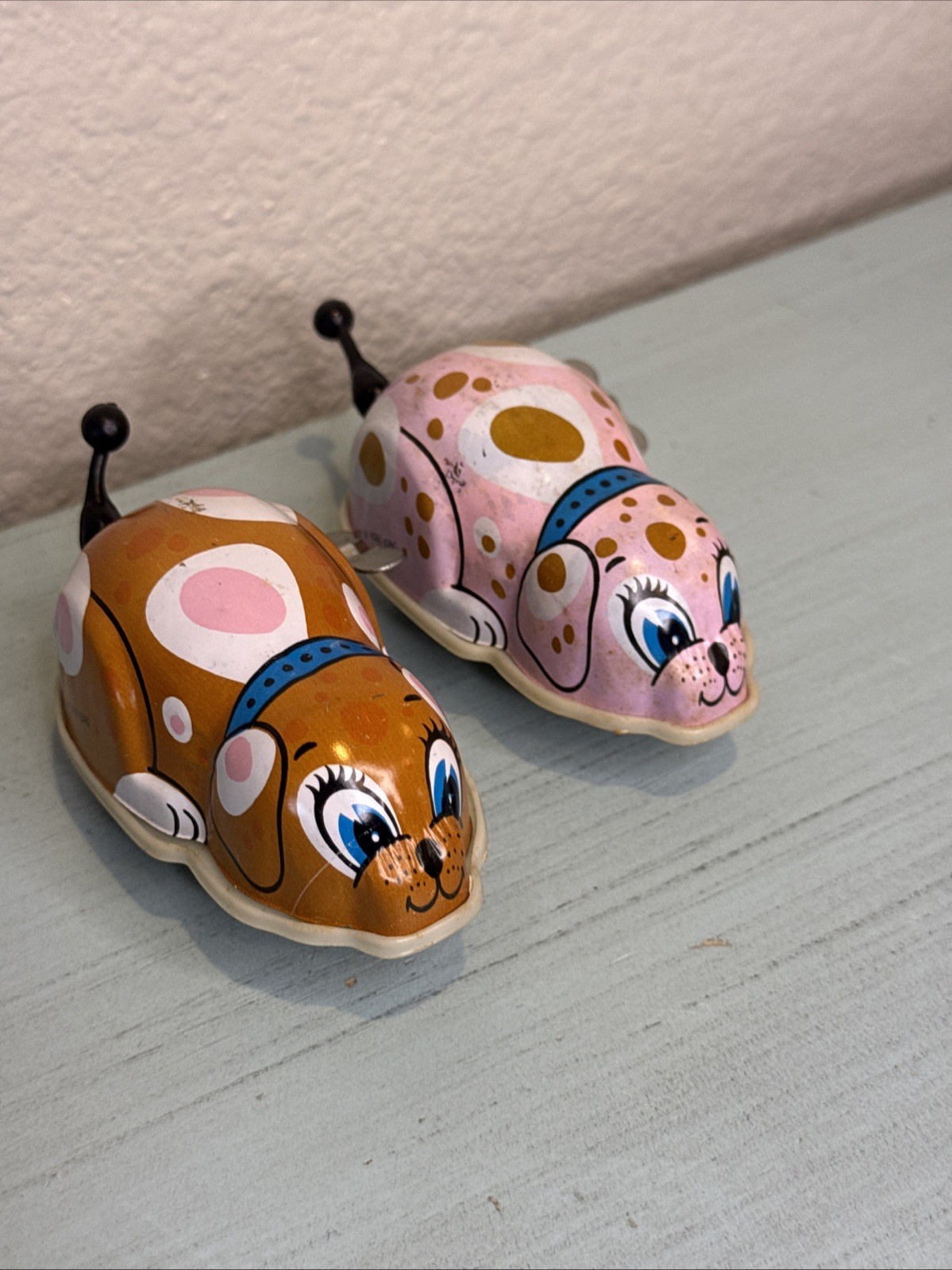 2 Vintage Wind Up Toy Dogs On Wheels w Spinning Tail Tin Mechanical Animal VIDEO
