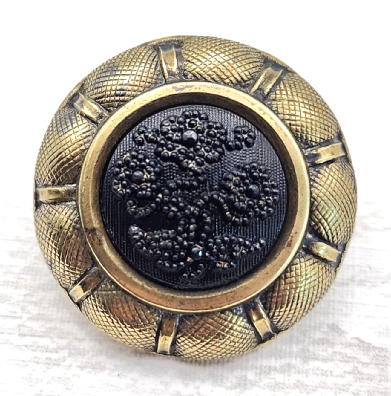 Antique Black Glass in Metal Button ~ Relief Glass Floral w/ Brass Border ~ 1"