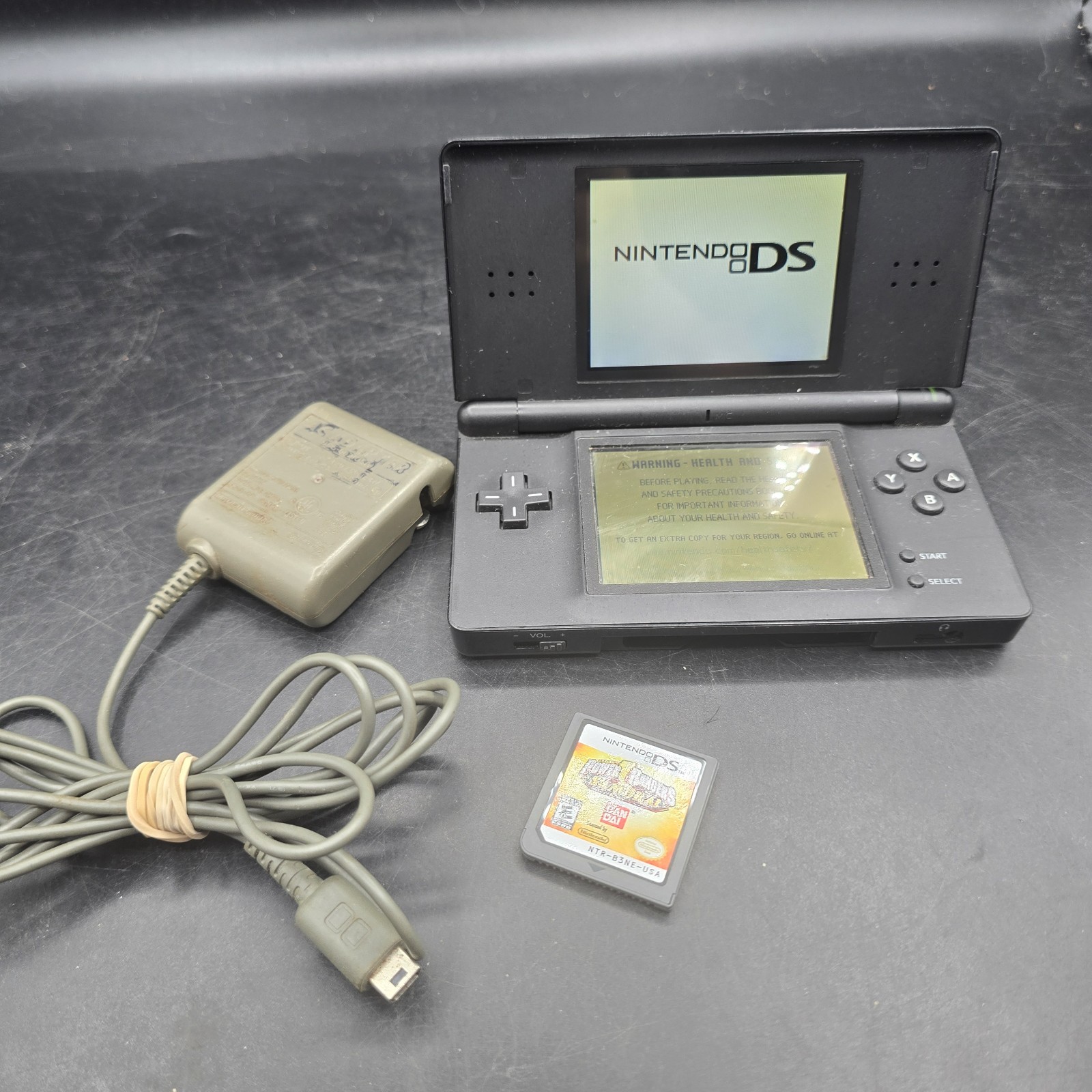 NINTENDO DS LIGHT WITH CHARGER TESTED