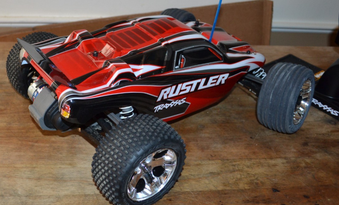 Traxx Rustler 2wd rolling chassis with servo and Crispy clean body