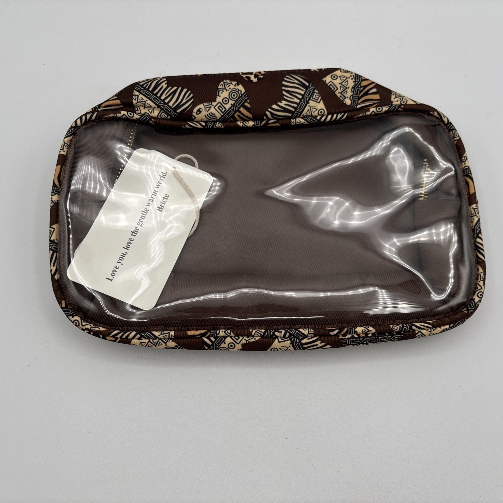 Bricte Brown with hearts makeup bag.