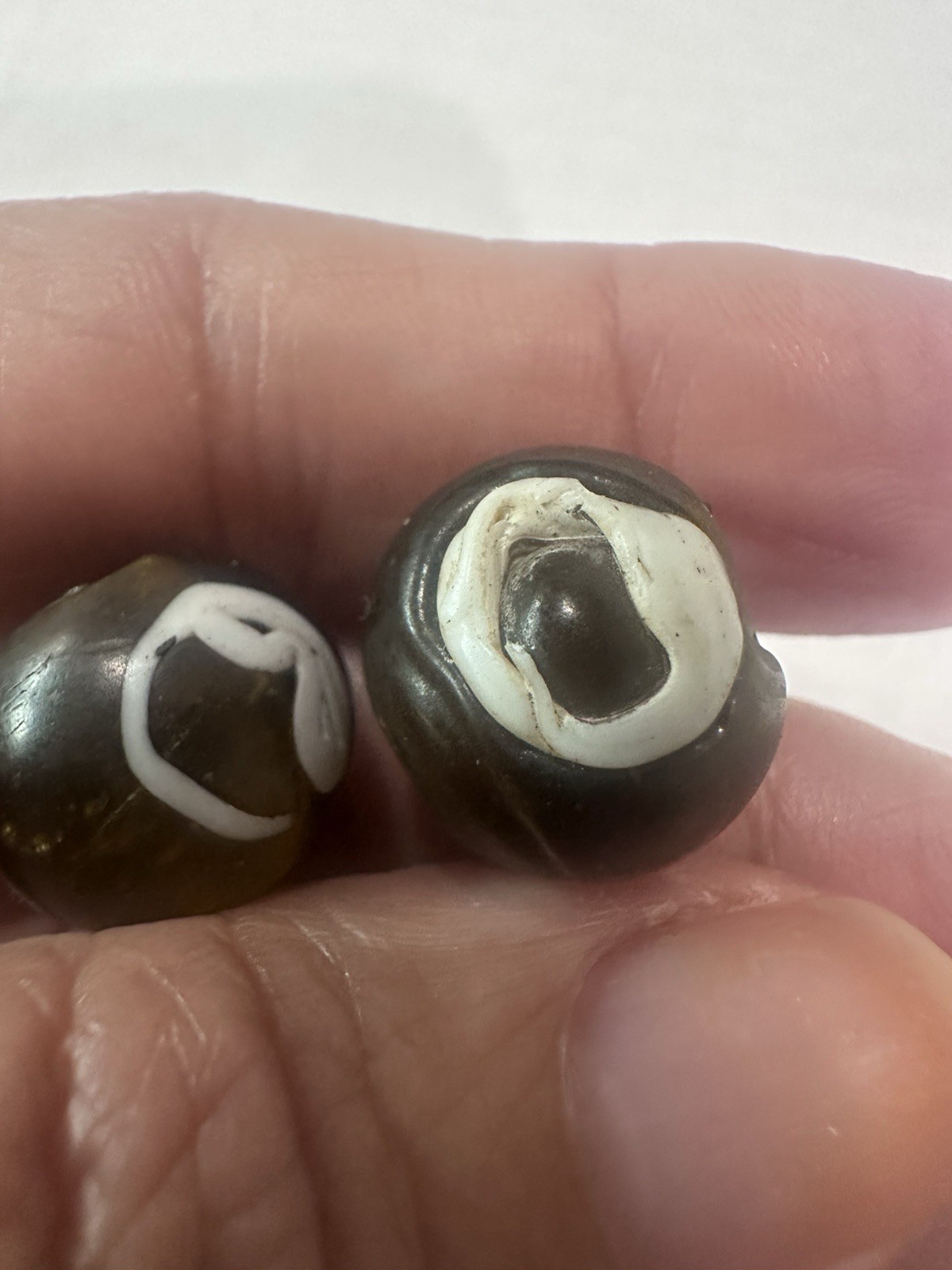 Old Glass Beads, Translucent Cola Brown tones with White Swirls lot of 2