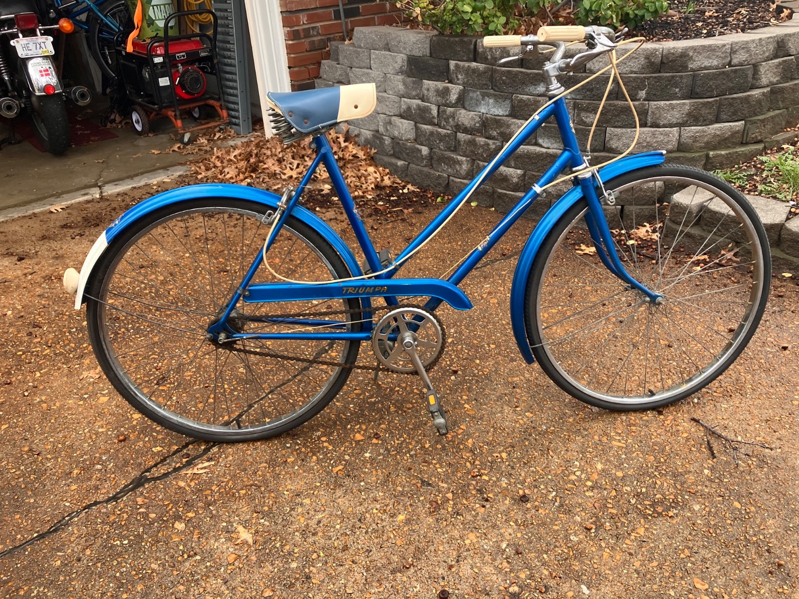 vintage blue and white Triump ladies bicycle