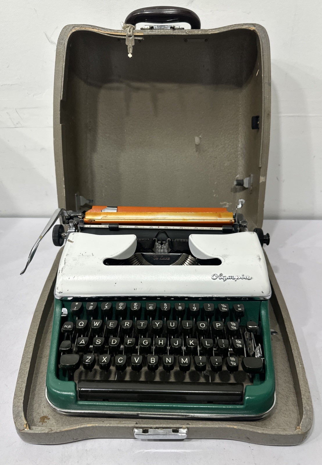 Vintage Olympia DeLuxe Portable Typewriter & Case