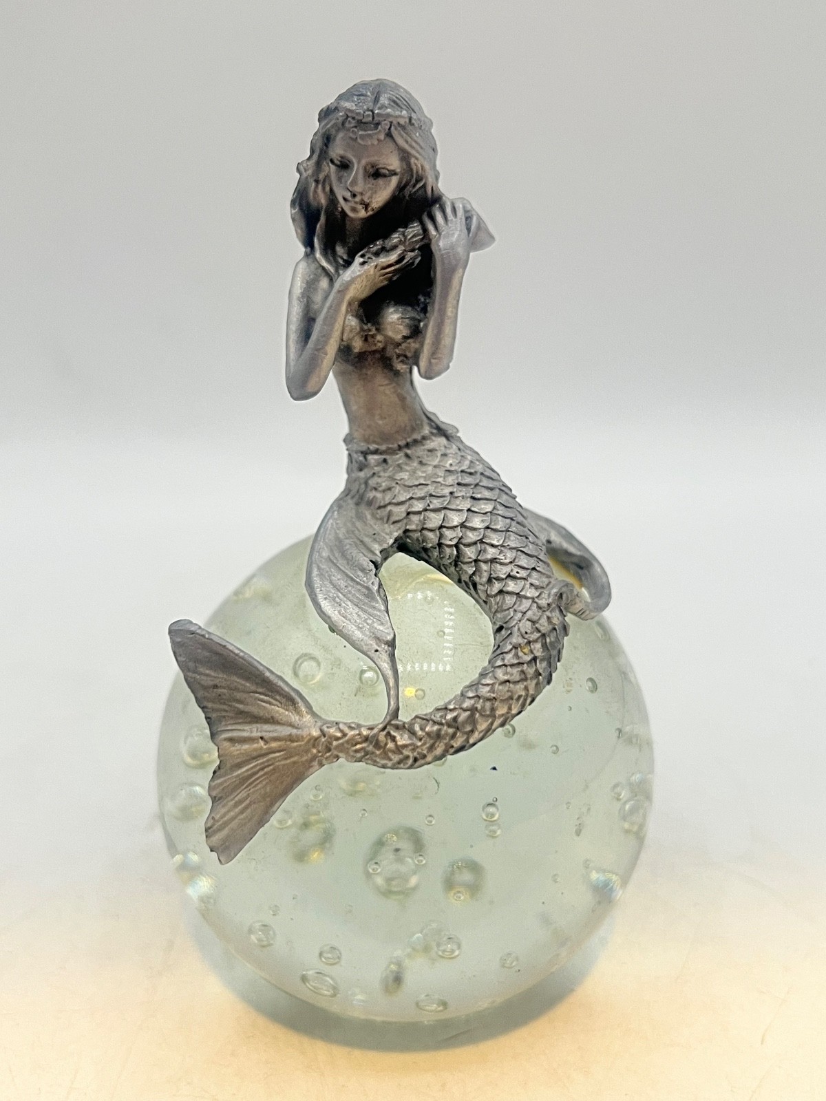 Pewter Mermaid on a bubble filled glass orb