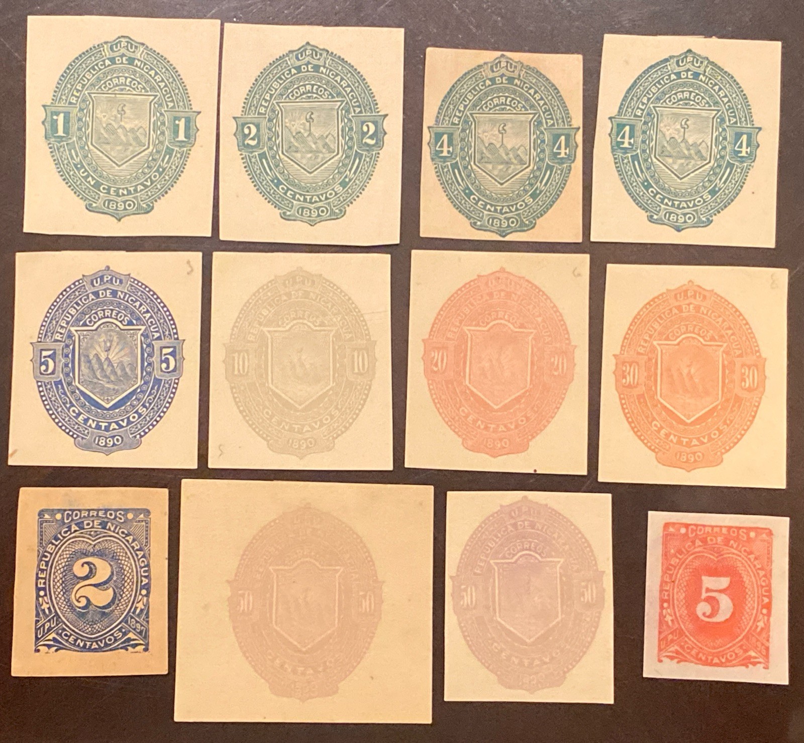 NICARAGUA 1890 POSTAGE STAMP WRAPPERS-CUT CORNERS-CUTOUTS USED & UNUSED (12)
