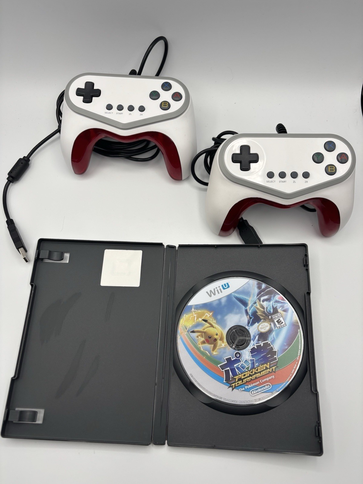 Lot Two Hori Wired Controllers for Wii U, plus Pokken Tournament Game Disc