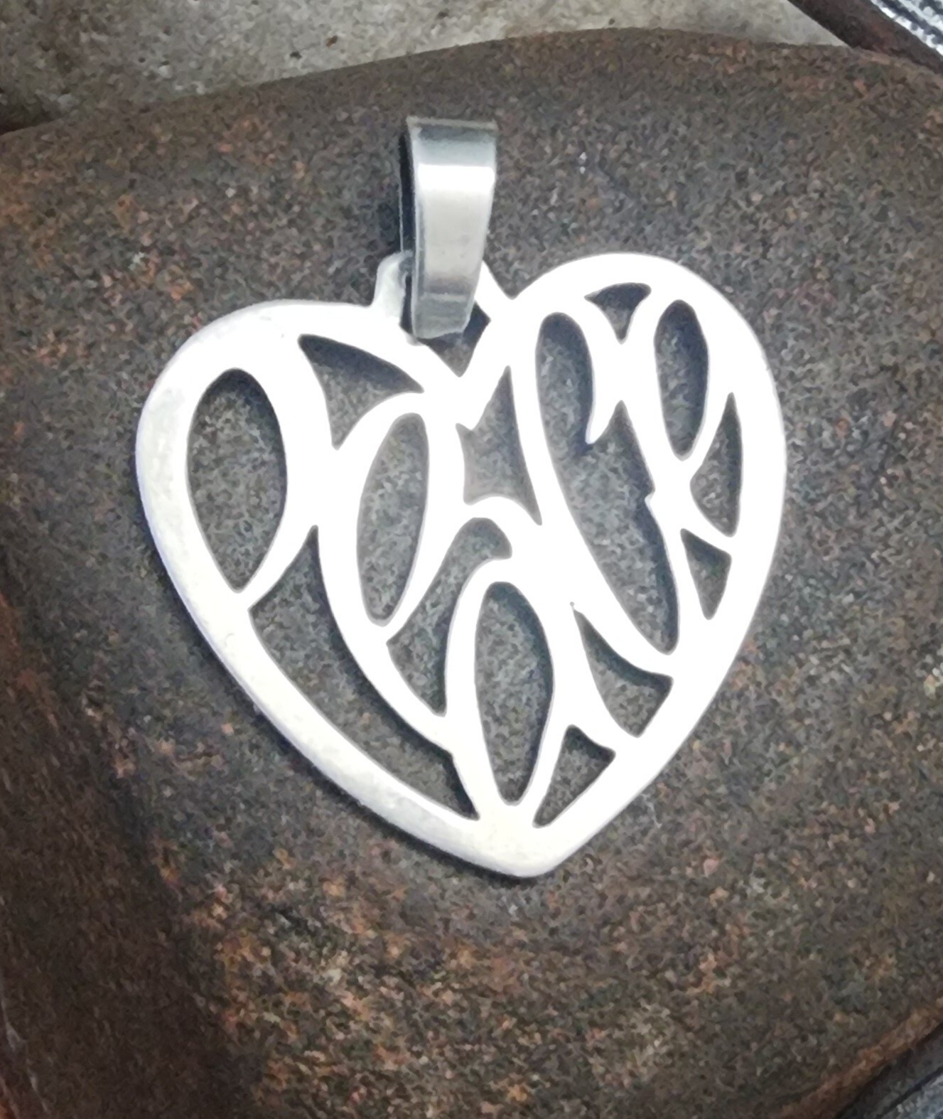 Retired James Avery  Heart pendant with PEACE Sterling Silver