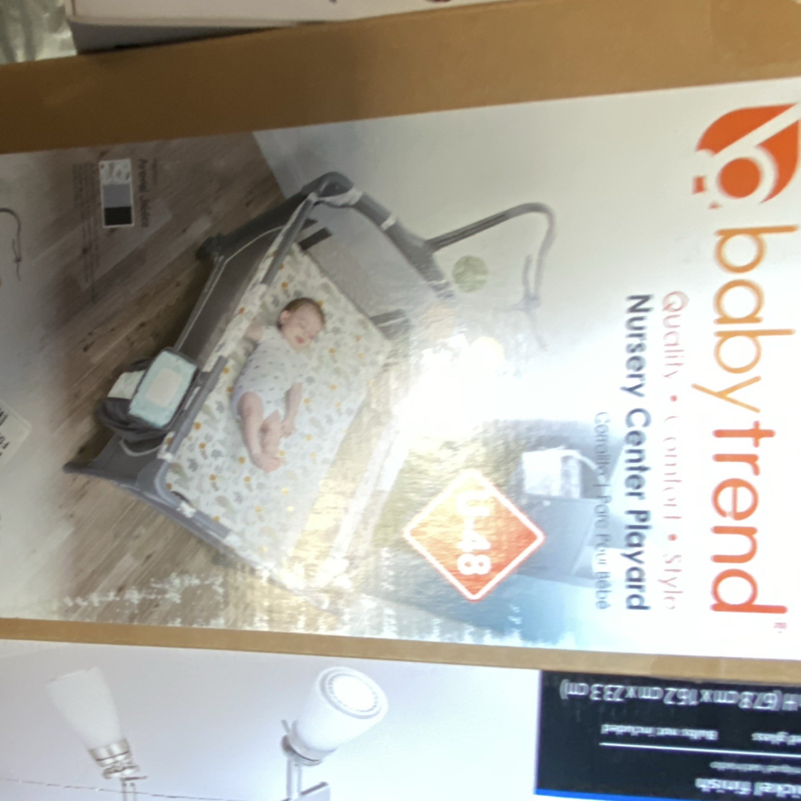 Baby Trend Play Yard U-48 Gray with Mobile Toys, Parent Organizer, Bassinet